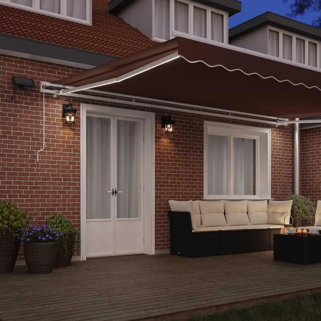 Manuelle Markise mit LED-Beleuchtung in Braun 500x300 cm, UV-beständiger Sonnenschutz für Terrasse und Balkon Dieser manuell bedienbare Kurbelmarkise in den Maßen 500x300 cm
