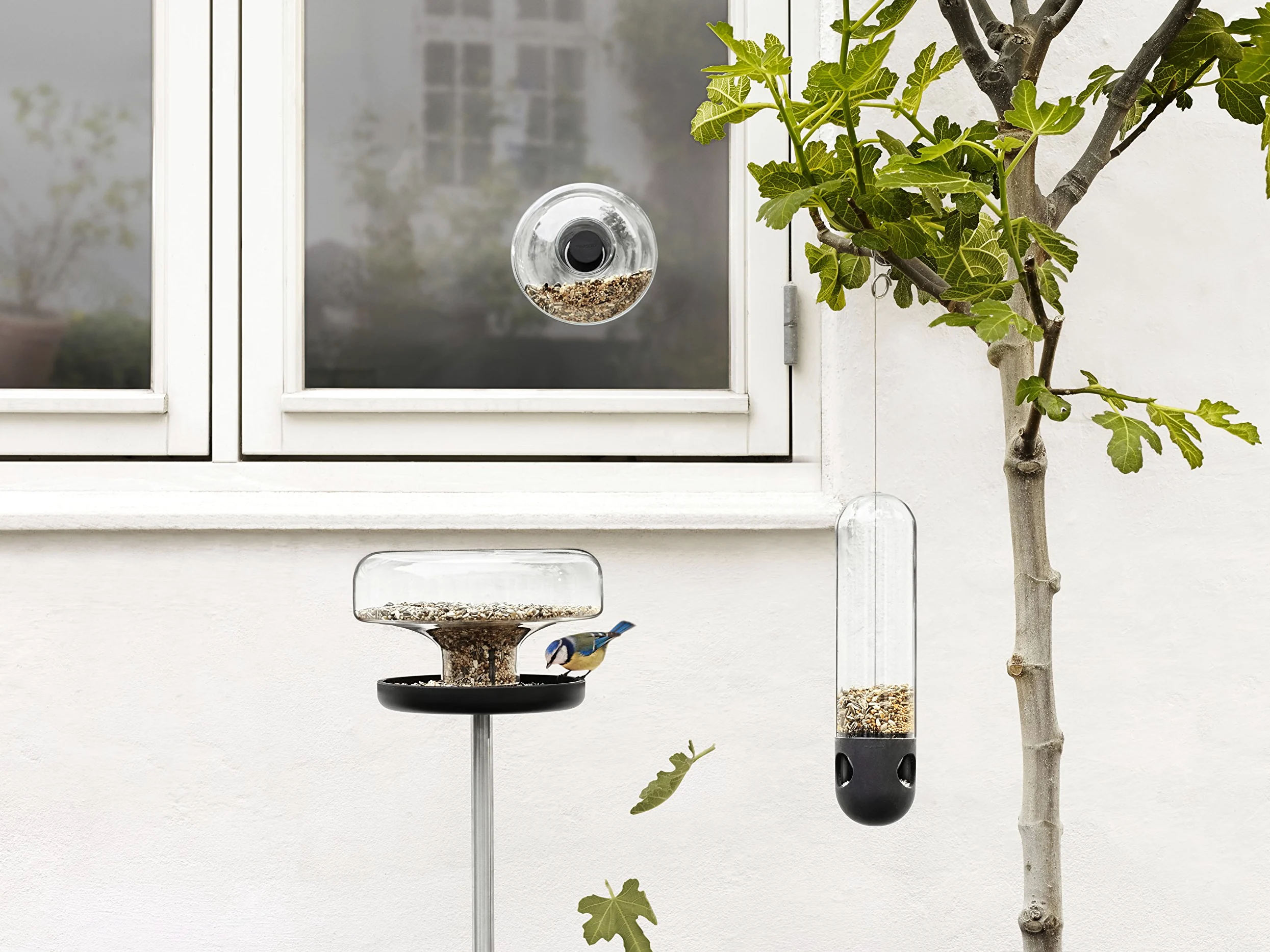 EVA SOLO | Vogelfutterstation | Dosiert das Vogelfutter, um einen Überschuss an Futter zu vermeiden; fasst etwa Zwei Liter Vogelfutter | Black/transparent